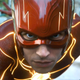 Ezra Miller as The Flash, preparing to run.